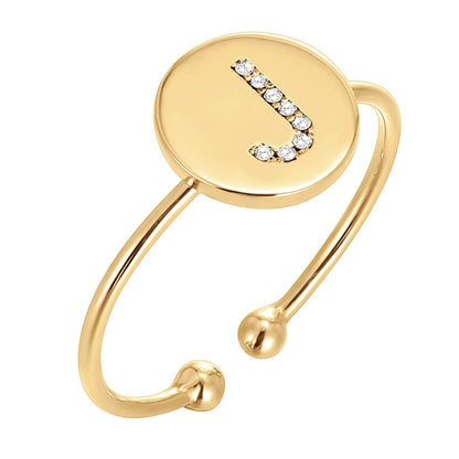 Regulowany pierścionek z literą "Gold Shine"